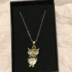 Gold tone necklace with owl pendant
